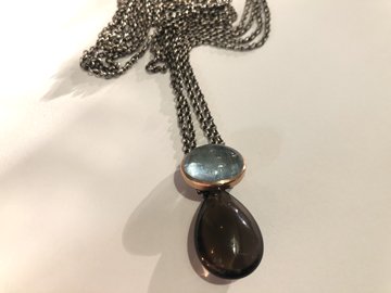 Aquamarin mit Anhänger an Silberkette
